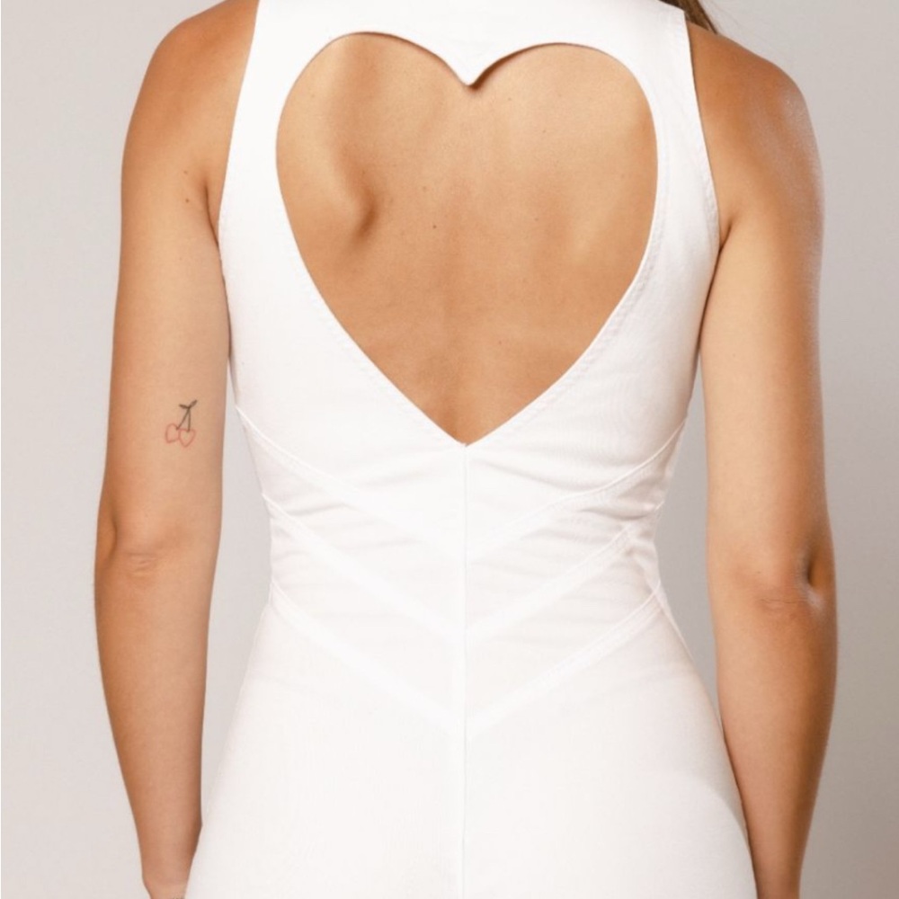 REVICE White Boot Cut Jumpsuit with Heart Back Cutout